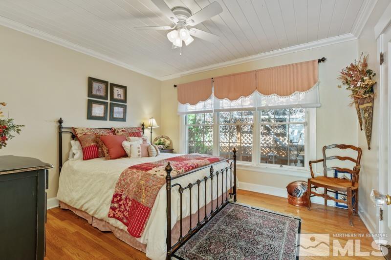 643 Manor Drive Reno, NV 89509 - Photo 20 of 37 a bedroom with a bed and a window
