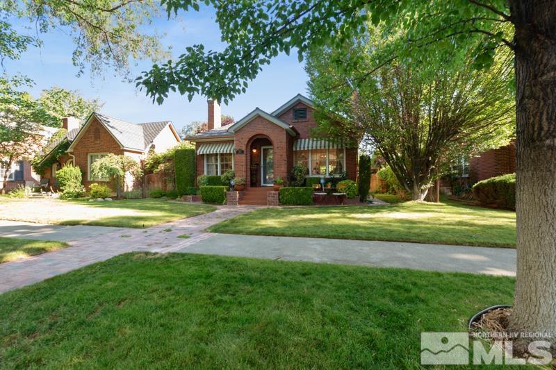 643 Manor Drive Reno, NV 89509 - Photo 2 of 37 a front view of a house with a yard