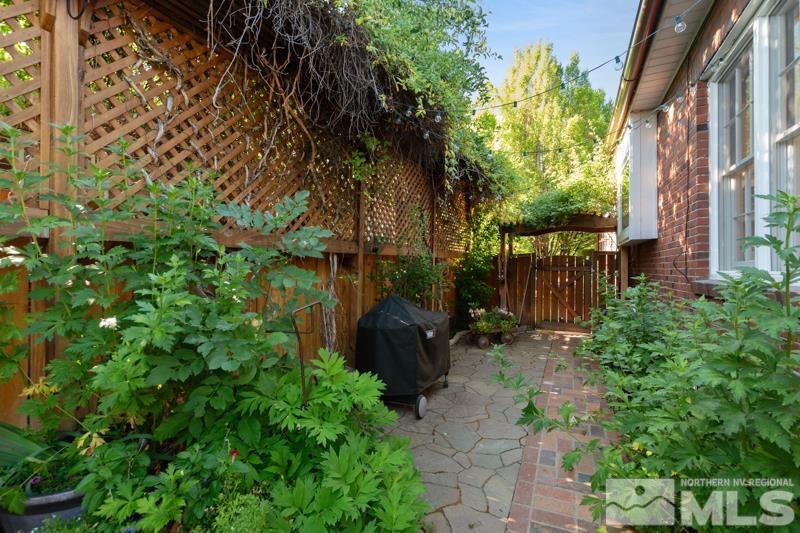 643 Manor Drive Reno, NV 89509 - Photo 34 of 37 a backyard of a house with lots of green space