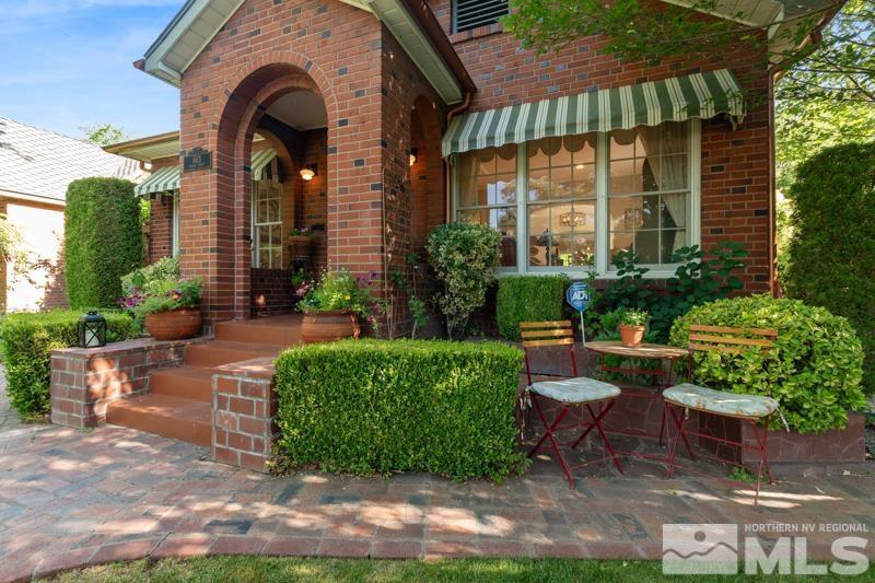 643 Manor Drive Reno, NV 89509 - Photo 4 of 37 a front view of a house with a yard