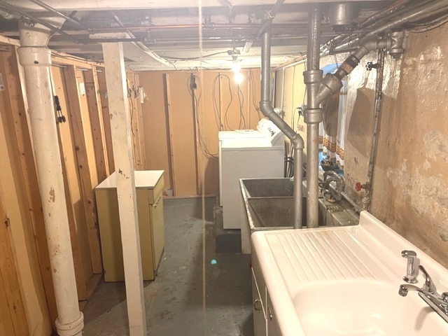 Undisclosed Address Chicago, IL 60639 - Photo 28 of 33 a view of a bathroom with tub and shower