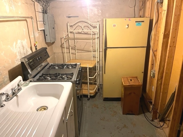 Undisclosed Address Chicago, IL 60639 - Photo 29 of 33 a bathroom with a sink and a washing machine