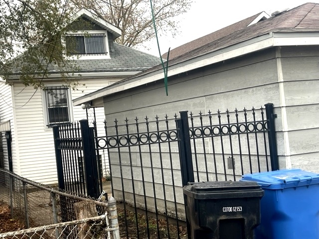 Undisclosed Address Chicago, IL 60639 - Photo 32 of 33 a view of a house with a window