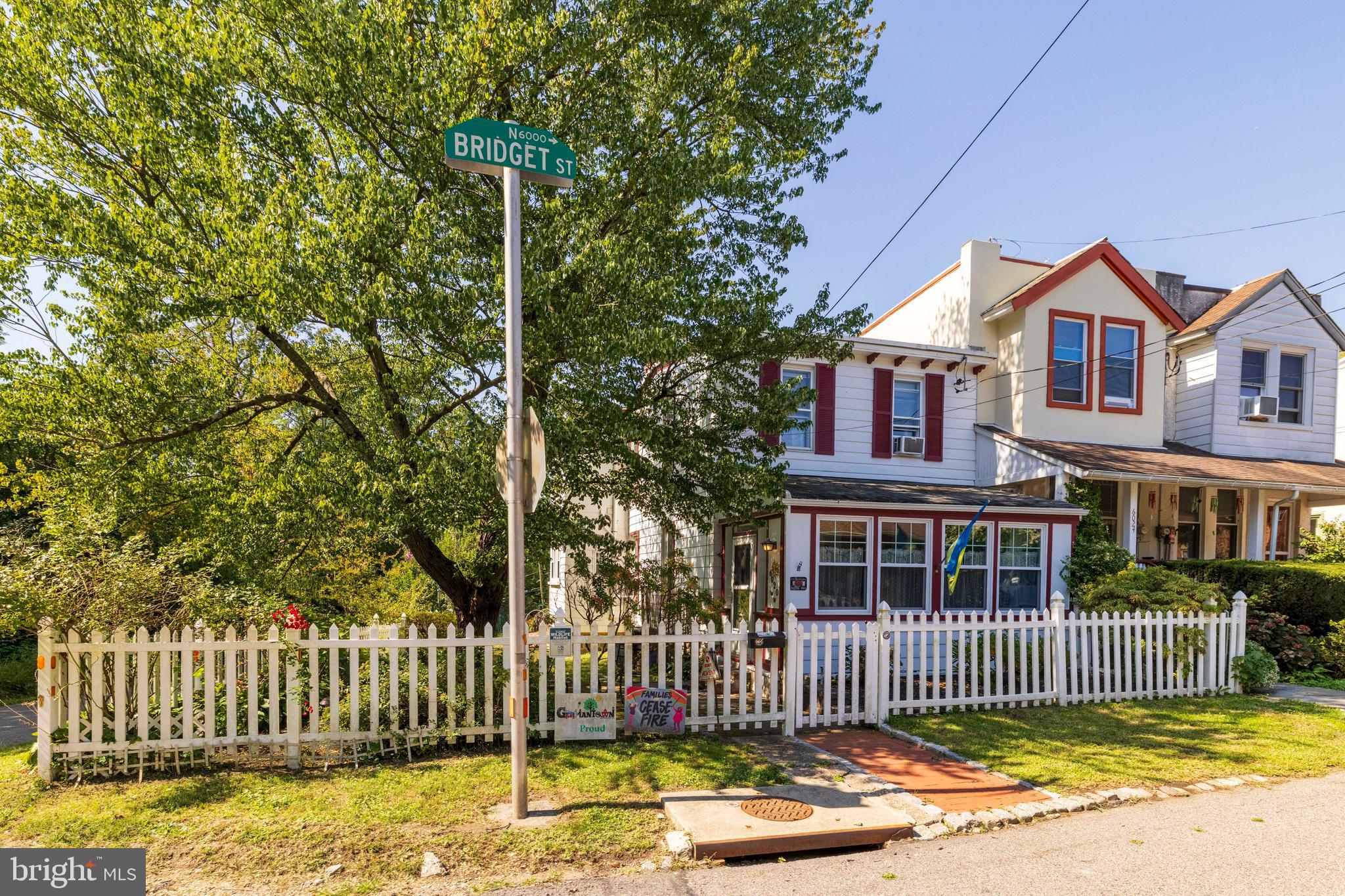 6020 Bridget Street Philadelphia, PA 19144 - Photo 1 of 43 a front view of a house with a garden and deck