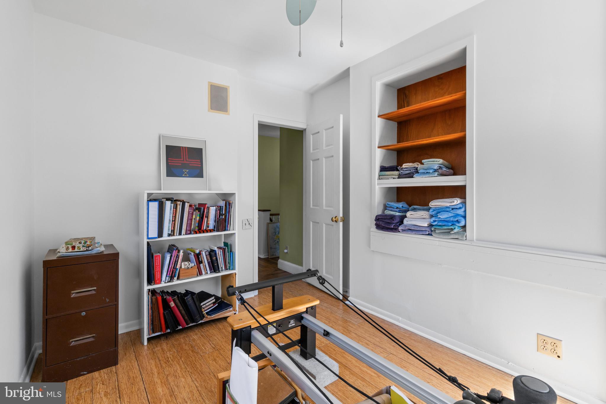 6020 Bridget Street Philadelphia, PA 19144 - Photo 20 of 43 a room with furniture and a book shelf