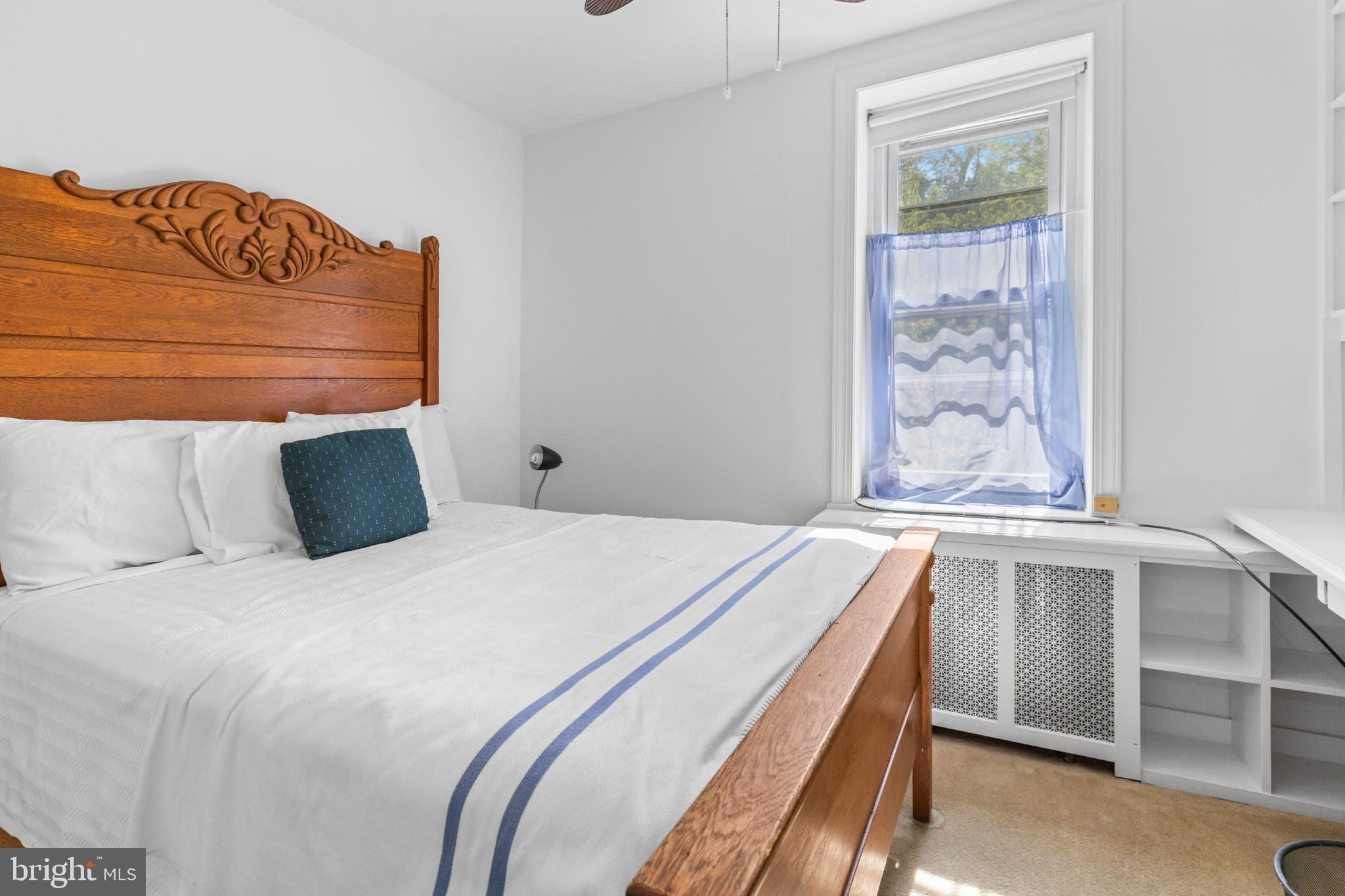 6020 Bridget Street Philadelphia, PA 19144 - Photo 21 of 43 a bedroom with a bed and a window