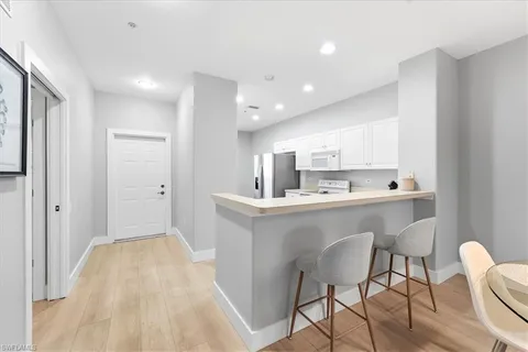 $385,000 | 8259 Parkstone Place, Unit 8, Naples, FL 34120