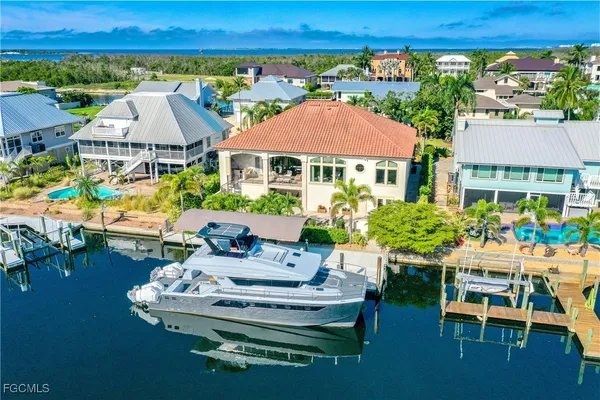 a balcony with furniture and a garden