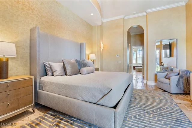 a living room with a bed and furniture