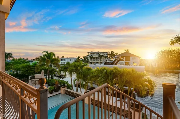 a view of a lake from a balcony