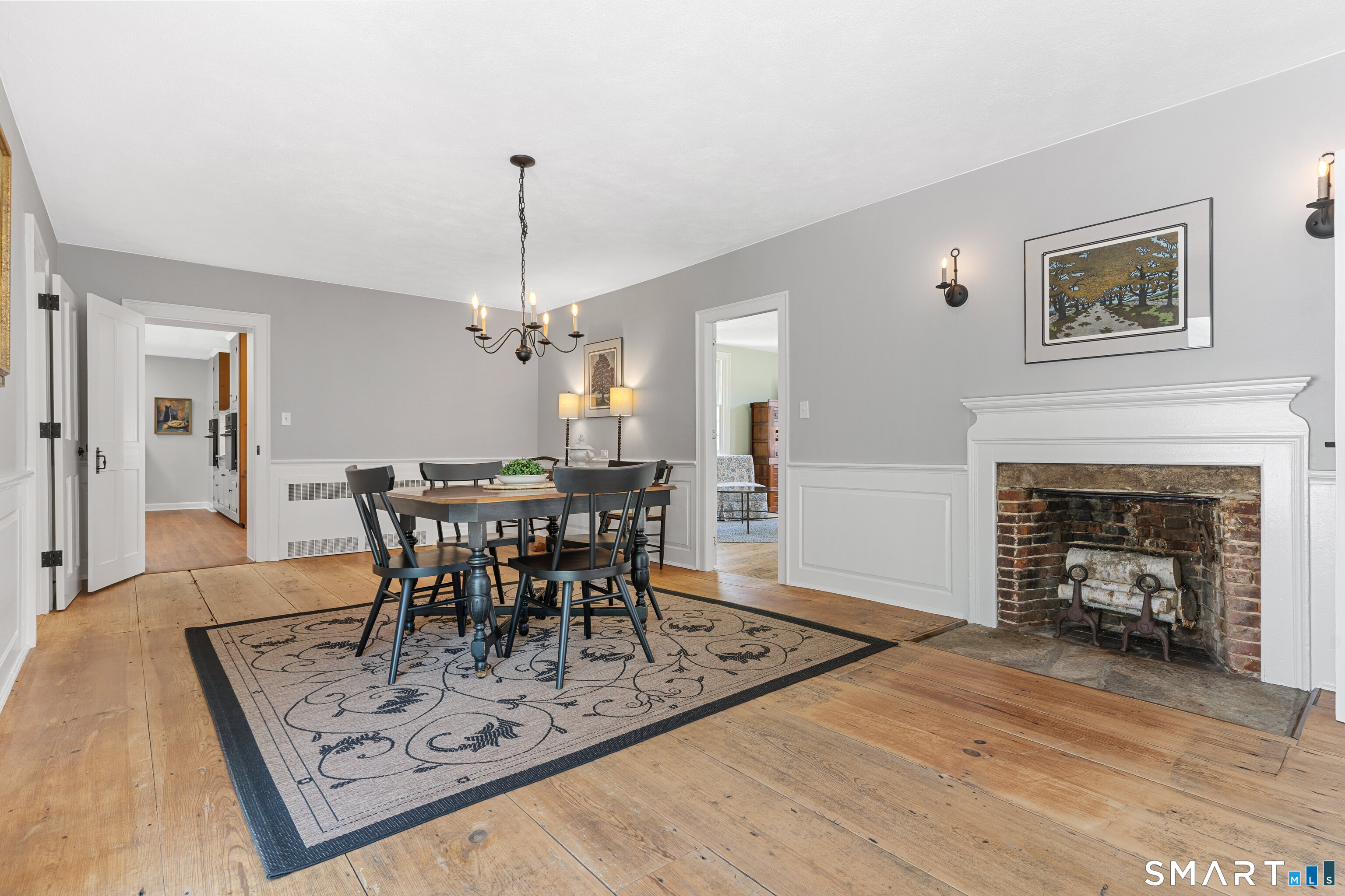 93 Upton Road Ashford, CT 06278 - Photo 8 of 40 Expansive formal dining room w/elegant paneled walls & fireplace.