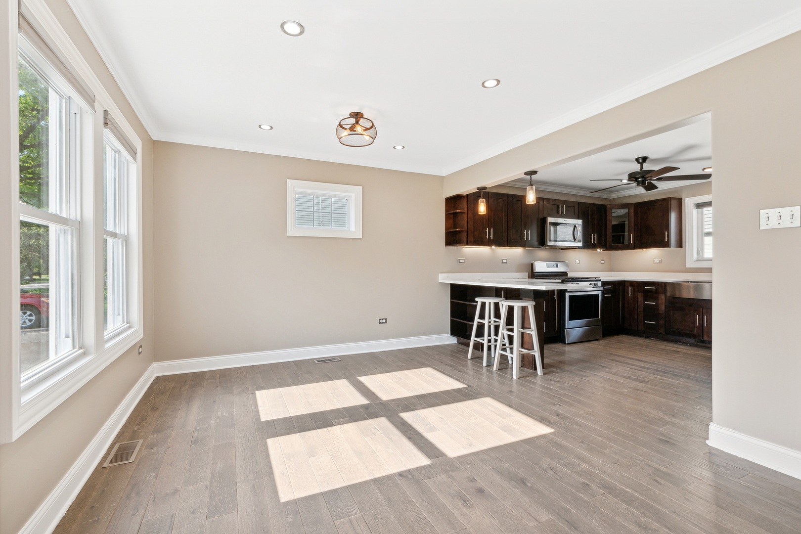825 South Prairie Road New Lenox, IL 60451 - Photo 13 of 42 a view of kitchen and kitchen with furniture wooden floor