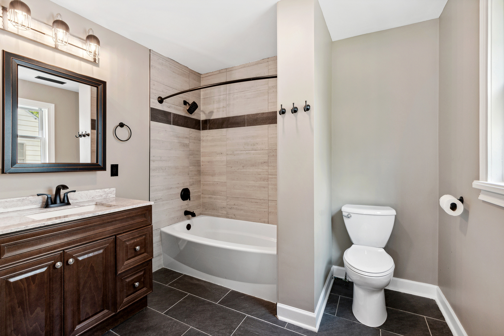 825 South Prairie Road New Lenox, IL 60451 - Photo 18 of 42 a bathroom with a toilet sink and mirror