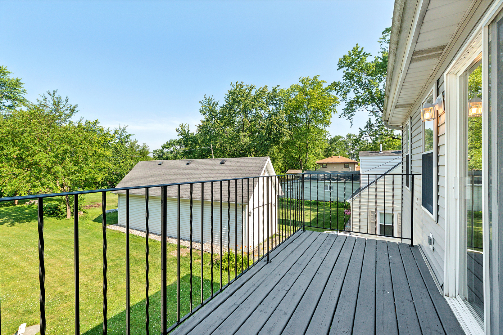 825 South Prairie Road New Lenox, IL 60451 - Photo 28 of 42 a view of a balcony with wooden floor
