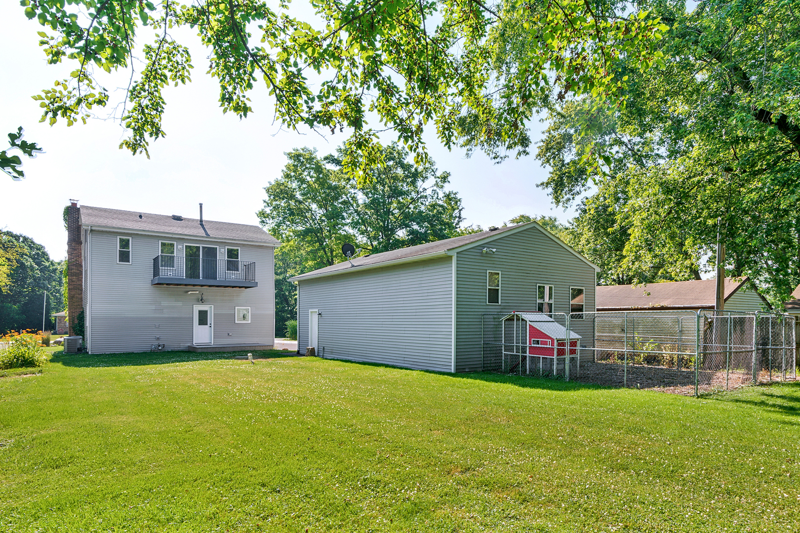 825 South Prairie Road New Lenox, IL 60451 - Photo 30 of 42 a front view of house with yard and seating area
