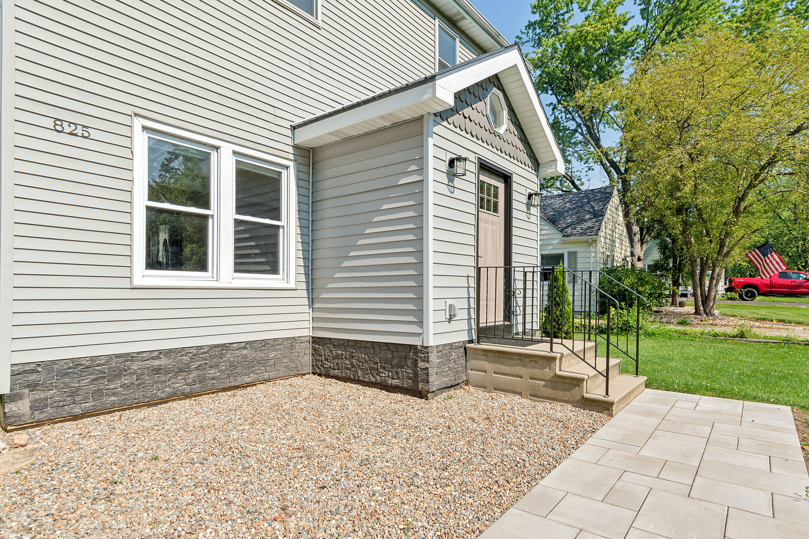825 South Prairie Road New Lenox, IL 60451 - Photo 7 of 42 a backyard of a house with garden and plants
