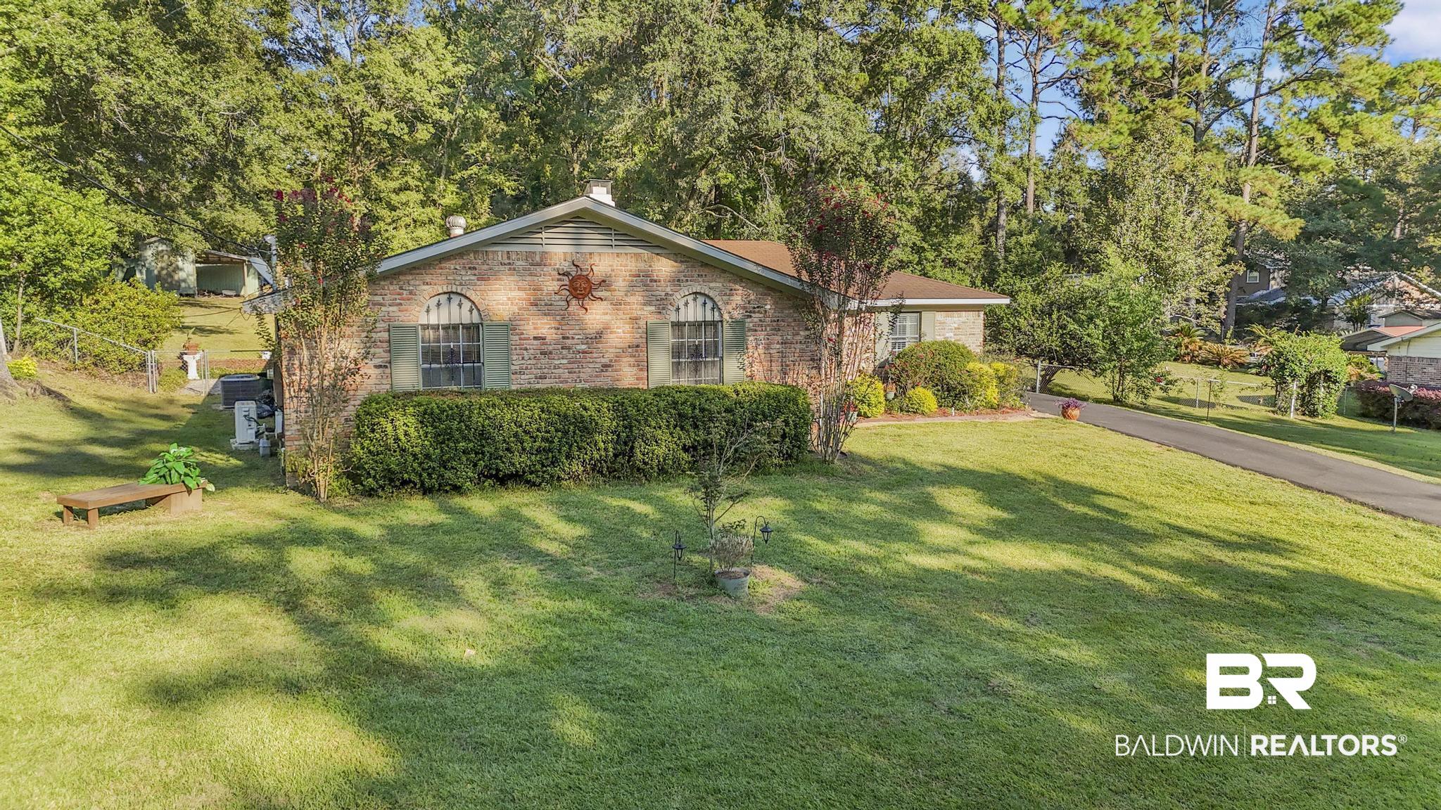 2573 E Road Mobile, AL 36693 - Photo 36 of 45 Ranch-style home with brick siding and a front lawn