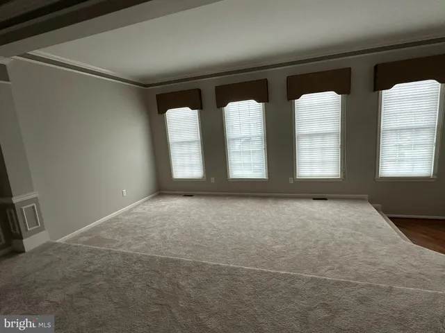 a kitchen with stainless steel appliances granite countertop a sink stove and microwave