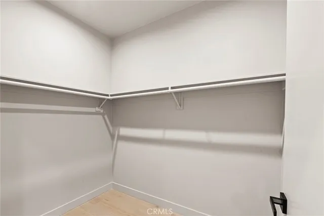 a view of a livingroom and a hallway