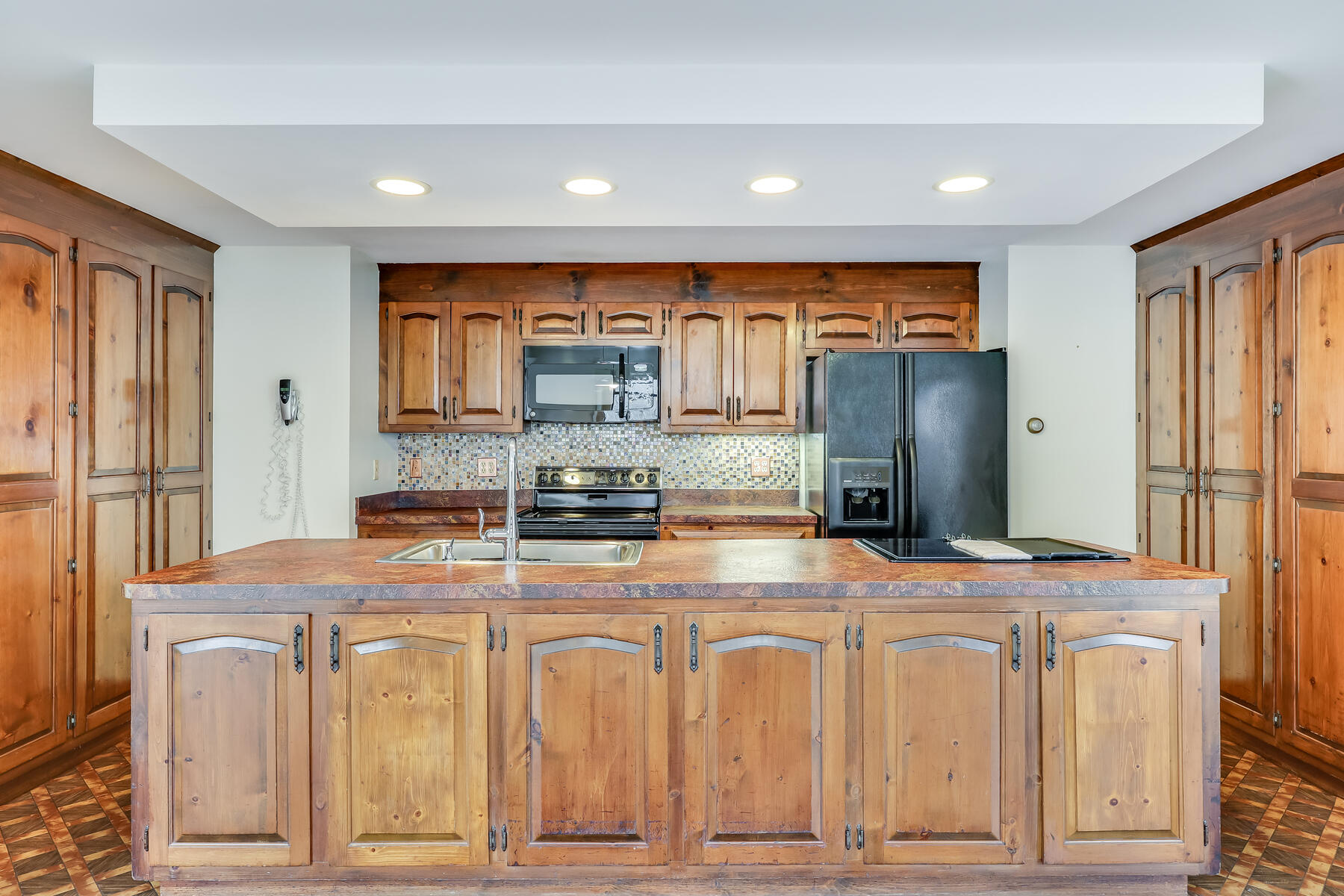 11 Menemsha Way East Falmouth, MA 02536 - Photo 20 of 50 a kitchen with stainless steel appliances granite countertop a refrigerator a stove and a sink
