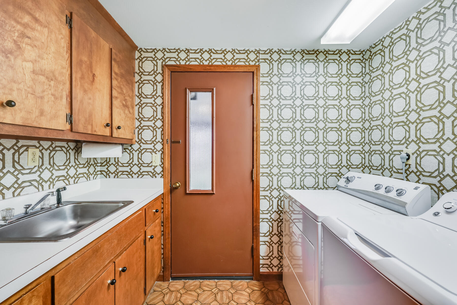 11 Menemsha Way East Falmouth, MA 02536 - Photo 25 of 50 a bathroom with a sink and a washing machine