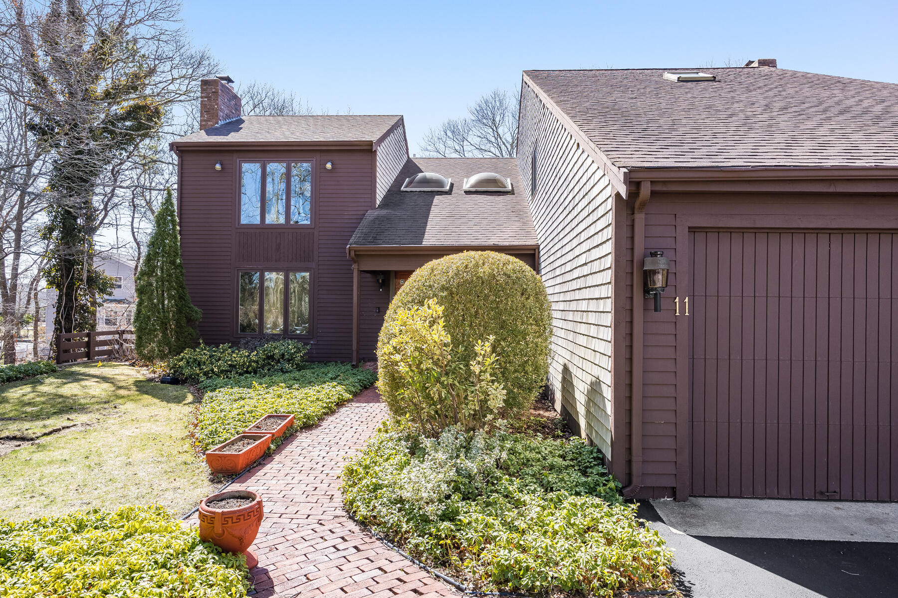 11 Menemsha Way East Falmouth, MA 02536 - Photo 3 of 50 a front view of a house with a yard