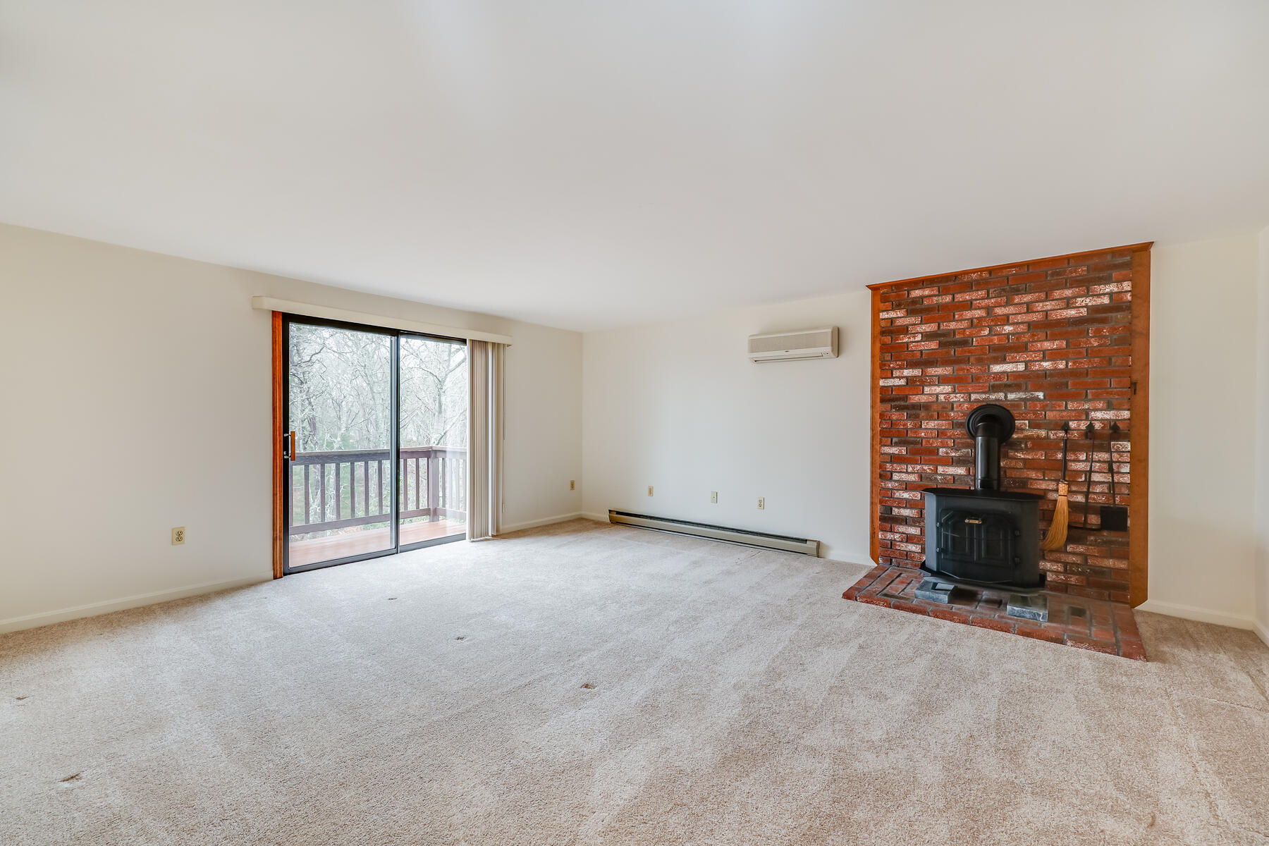 11 Menemsha Way East Falmouth, MA 02536 - Photo 34 of 50 a view of an empty room with a fireplace