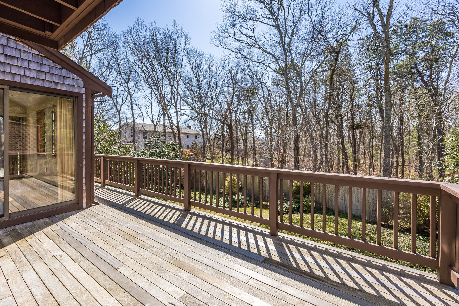 11 Menemsha Way East Falmouth, MA 02536 - Photo 43 of 50 a view of balcony with wooden floor and fence