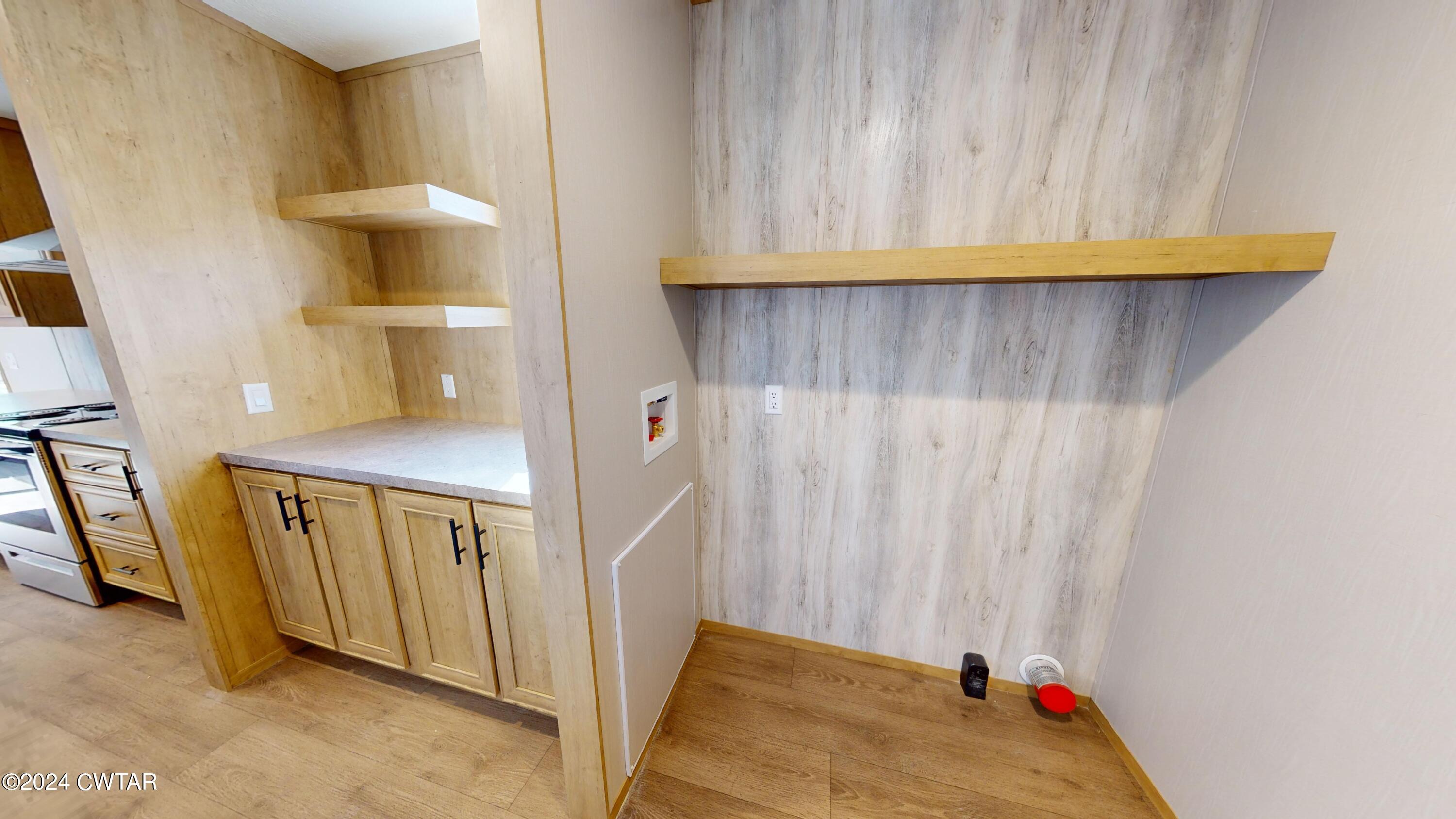463 Peckerwood Point Road Newbern, TN 38059 - Photo 13 of 35 a view of a room with wooden walls