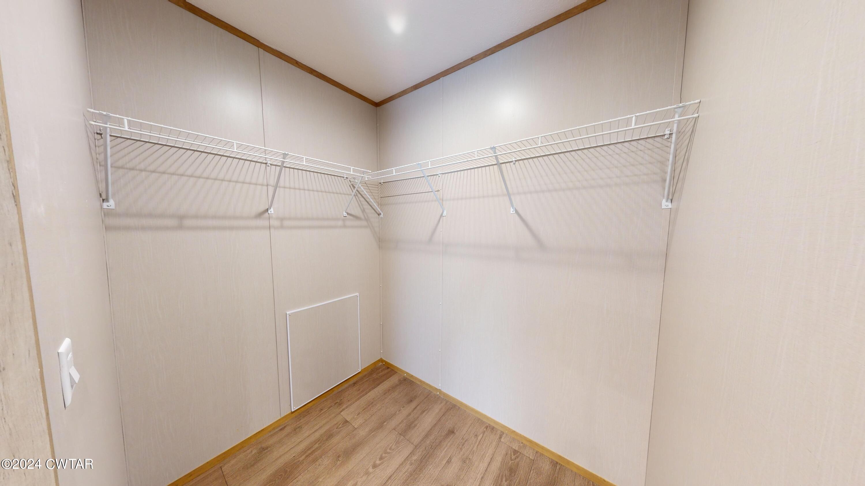 463 Peckerwood Point Road Newbern, TN 38059 - Photo 20 of 35 a view of a room with racks on the wall