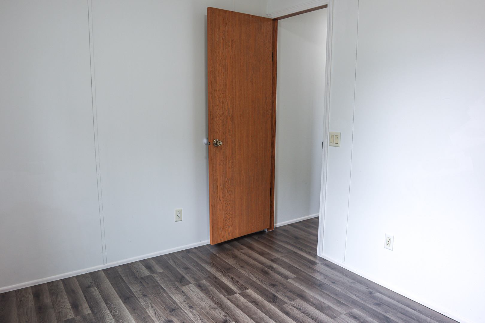 6 Countryside Estates Sandwich, IL 60548 - Photo 21 of 26 a view of an empty room with wooden floor