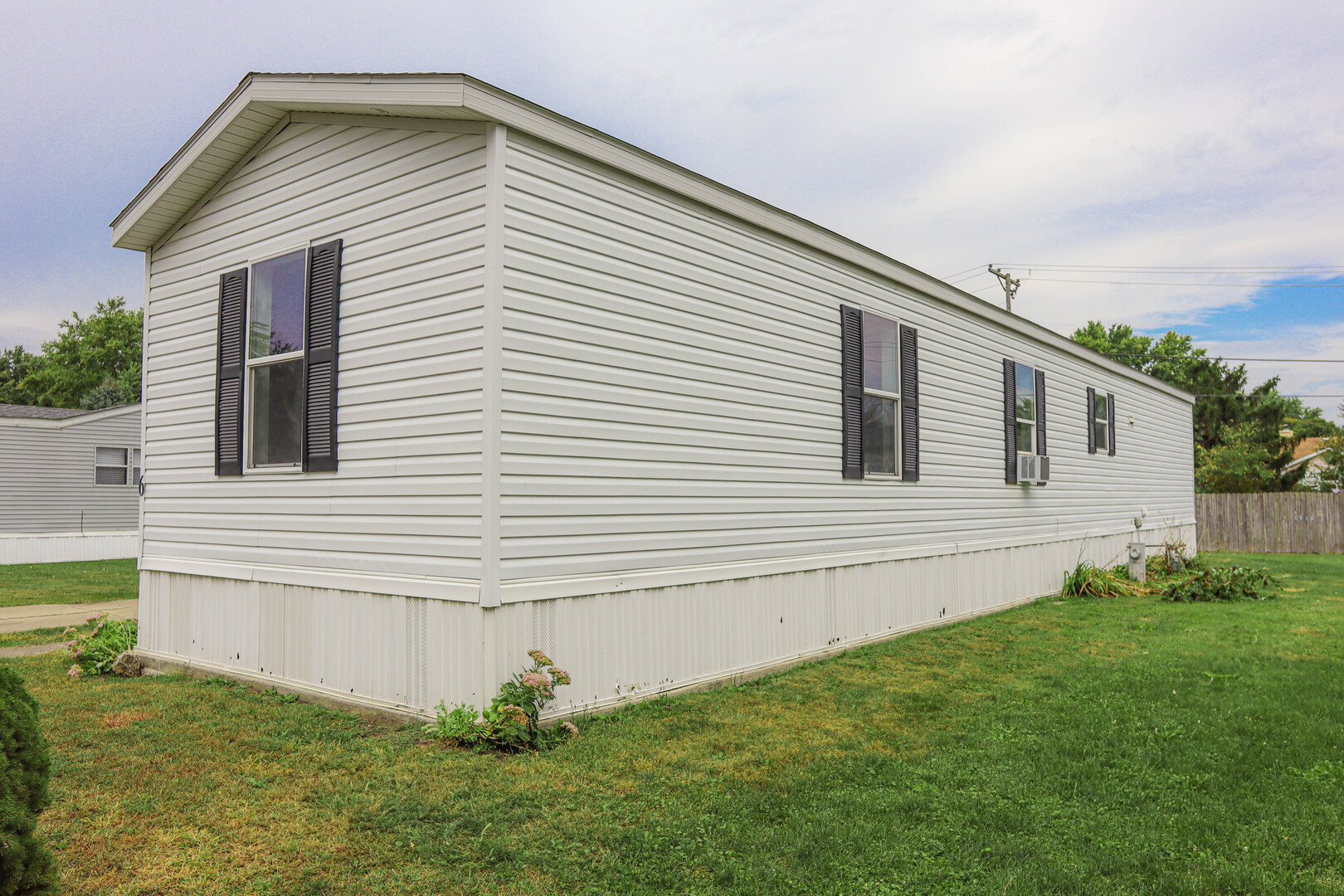 6 Countryside Estates Sandwich, IL 60548 - Photo 5 of 26 a view of backyard of house