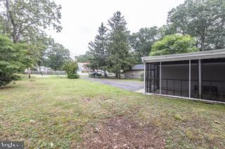 112 East 7th Avenue Pine Hill, NJ 08021 - Photo 22 of 27 a view of a house with yard and porch