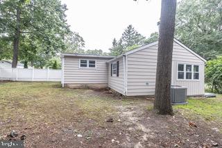112 East 7th Avenue Pine Hill, NJ 08021 - Photo 23 of 27 a view of a house with a backyard