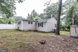 112 East 7th Avenue Pine Hill, NJ 08021 - Photo 26 of 27 a view of a house with a yard and a tree