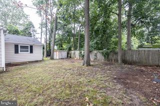 112 East 7th Avenue Pine Hill, NJ 08021 - Photo 27 of 27 a backyard of a house with lots of green space