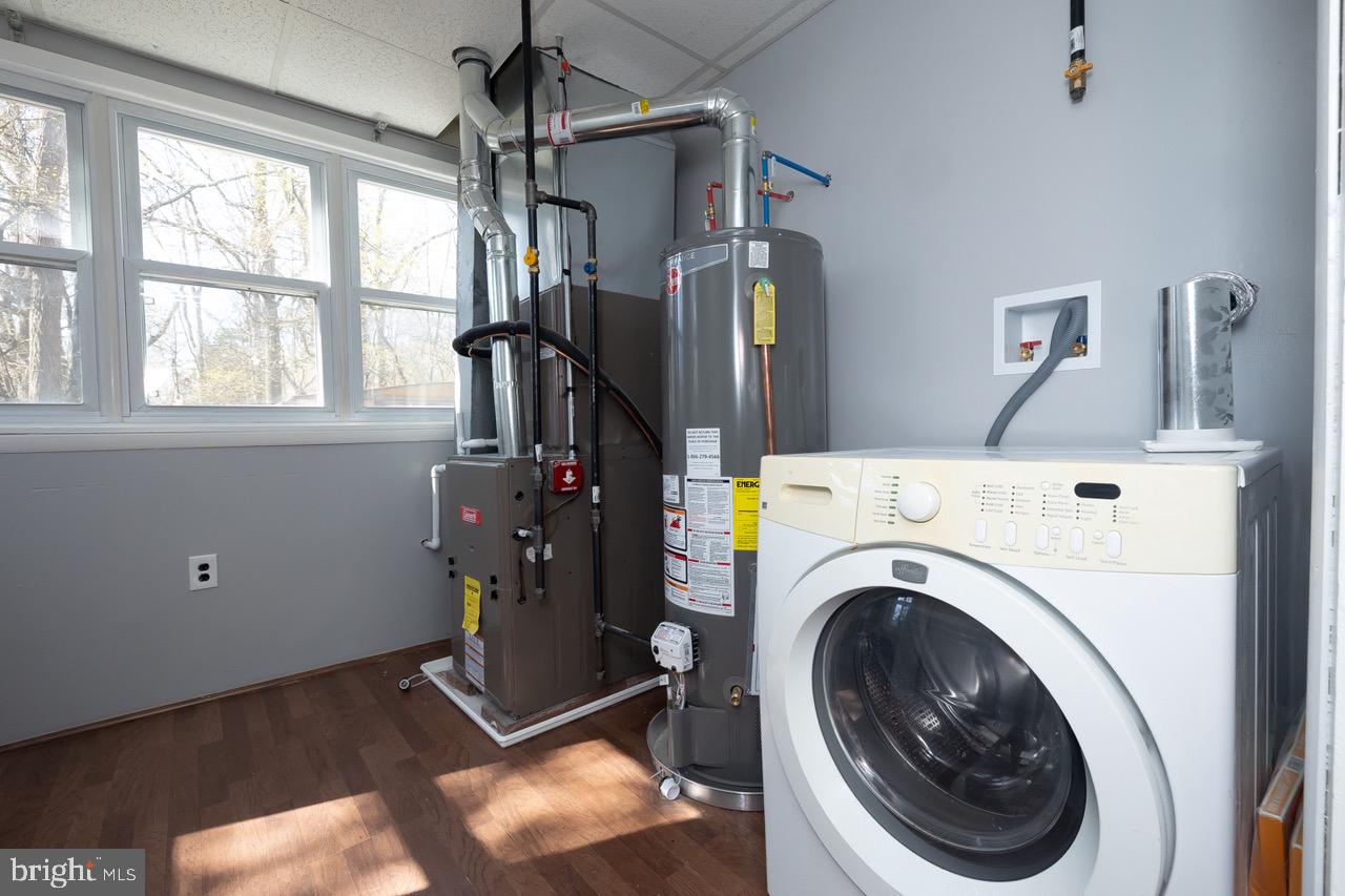 112 East 7th Avenue Pine Hill, NJ 08021 - Photo 7 of 27 a view of entryway with washer and dryer