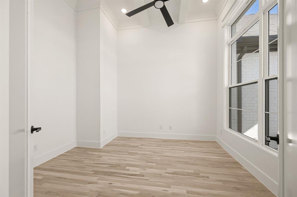 2139 Kingston Street Haslet, TX 76052 - Photo 5 of 40 a view of a room with wooden floor and windows
