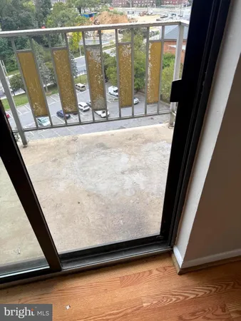 a view of a balcony with an outdoor space