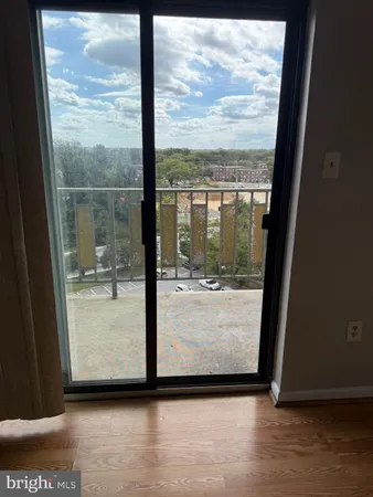a view of a glass door and the window