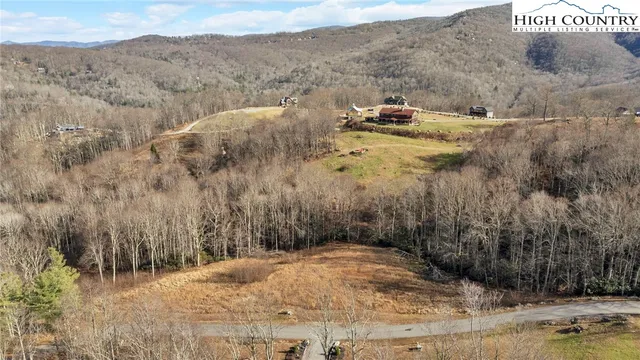 a view of a dry yard with mountain