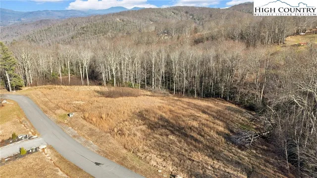 a view of a backyard of the house