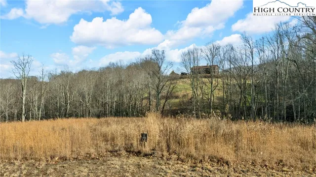 a view of a yard covered with snow
