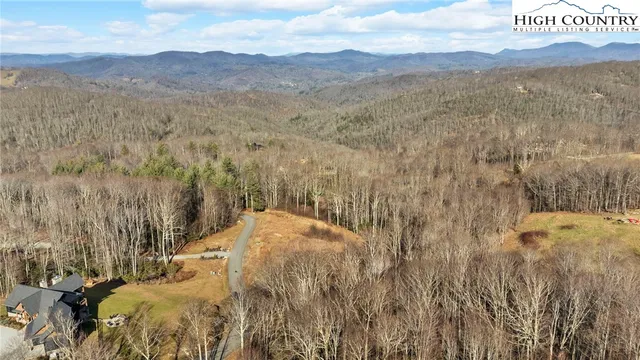 a view of mountain view with mountains in the background