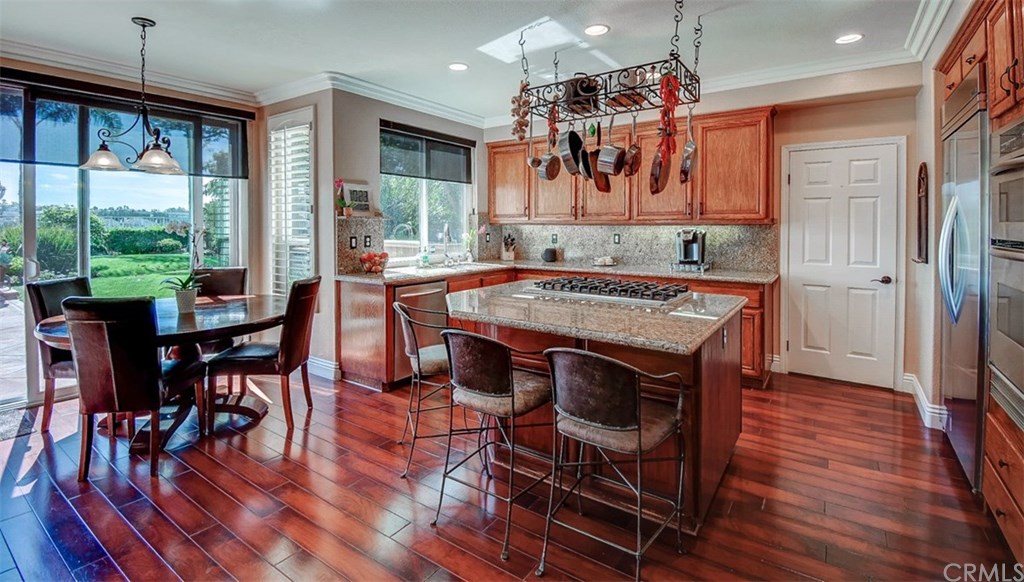 2 High Bluff Laguna Niguel, CA 92677 - Photo 12 of 37 a view of a dining room with furniture window and wooden floor