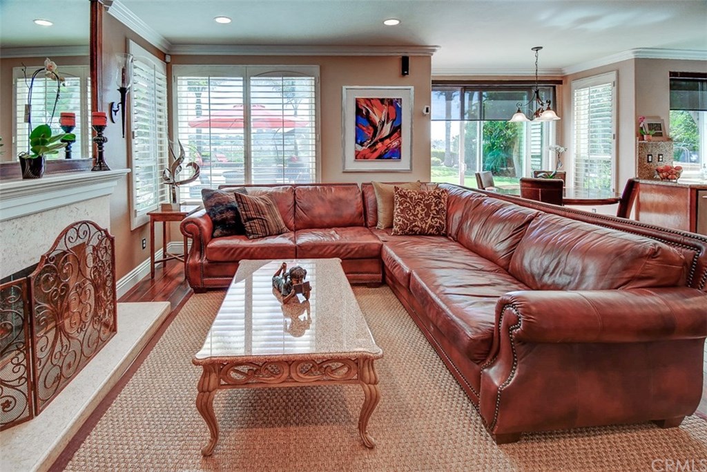 2 High Bluff Laguna Niguel, CA 92677 - Photo 13 of 37 a living room with furniture fireplace and large windows