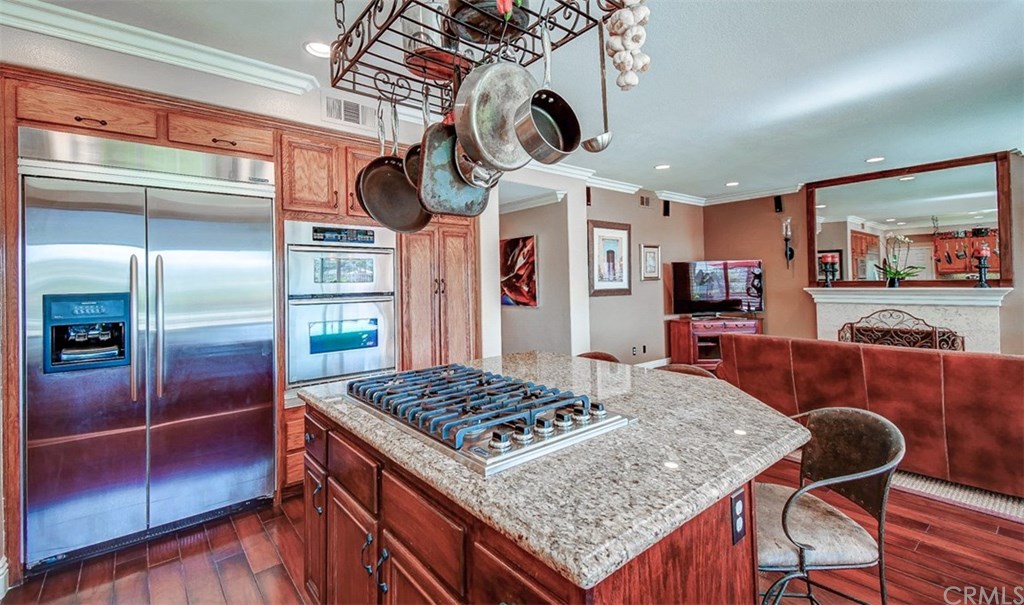 2 High Bluff Laguna Niguel, CA 92677 - Photo 14 of 37 a kitchen with a table and chairs