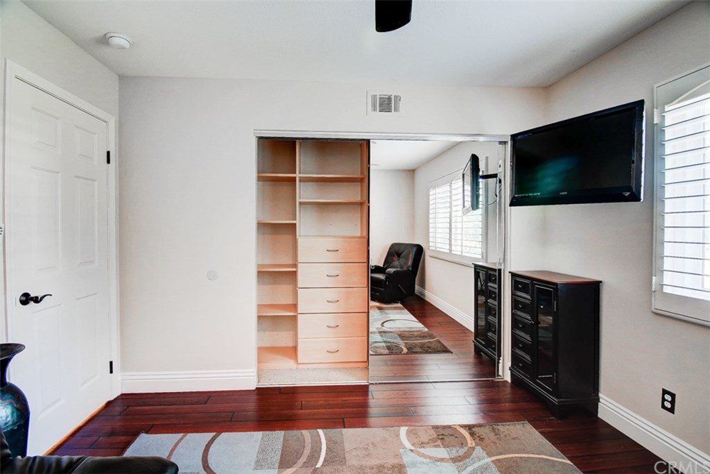 2 High Bluff Laguna Niguel, CA 92677 - Photo 21 of 37 a view of a livingroom with wooden floor and a flat screen tv