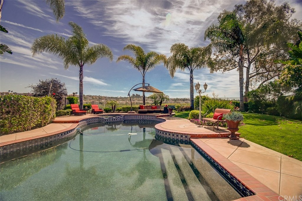 2 High Bluff Laguna Niguel, CA 92677 - Photo 33 of 37 a view of a backyard with swimming pool and sitting area