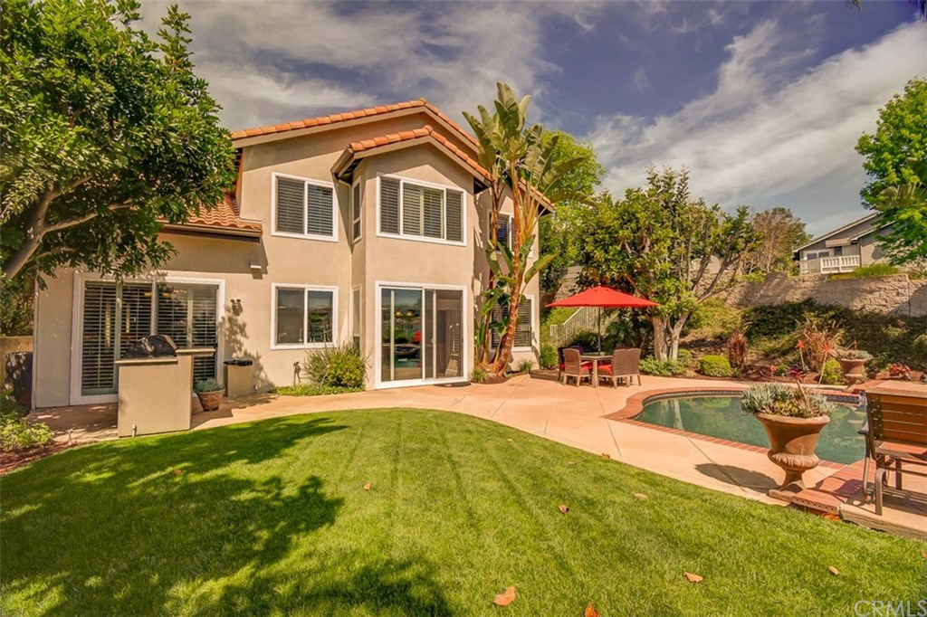 2 High Bluff Laguna Niguel, CA 92677 - Photo 34 of 37 a view of a house with swimming pool and sitting area